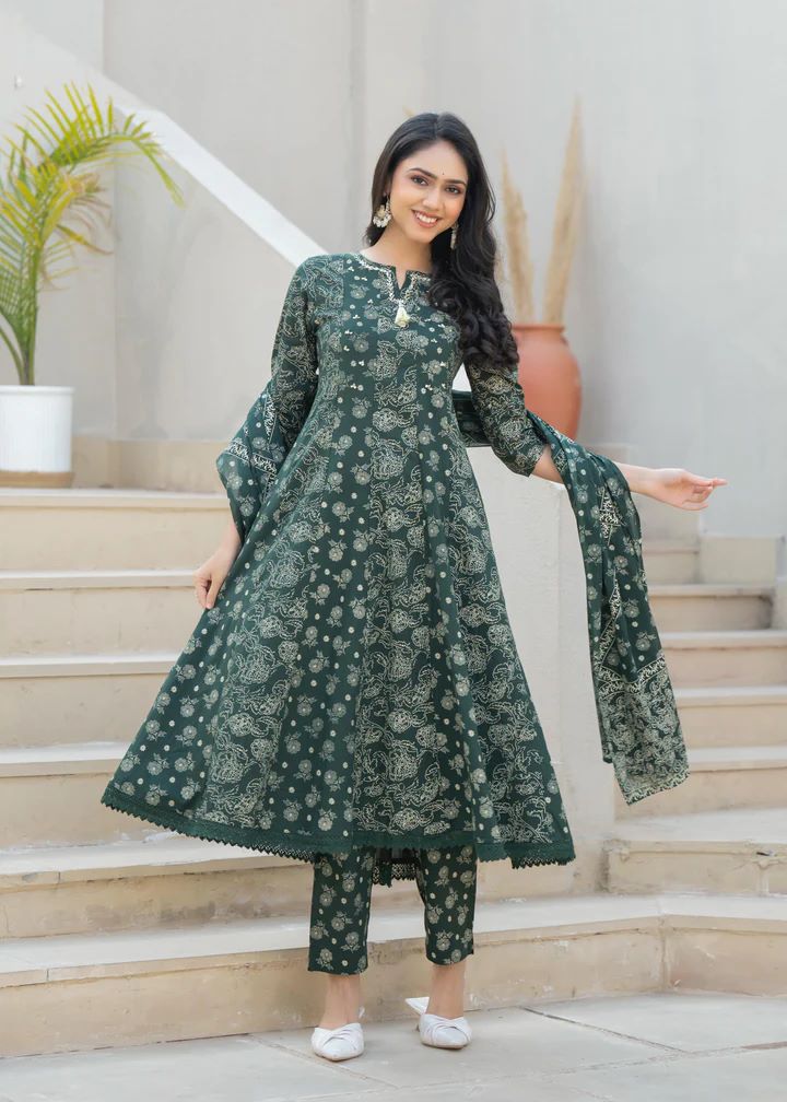 Pleated flared tunic with peacock embroidery and sheer bordered dupatta.